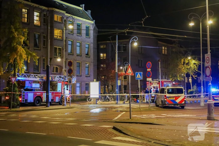 Rook- en waterschade in woning door brand in gordijn