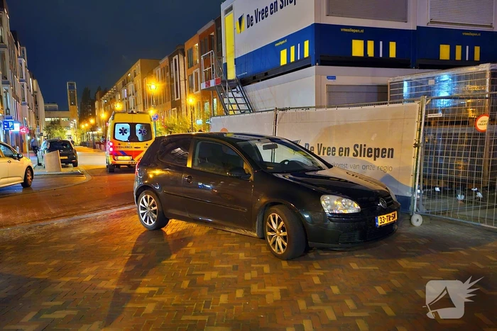 Fietser en automobilist in botsing
