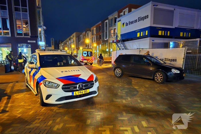 Fietser en automobilist in botsing