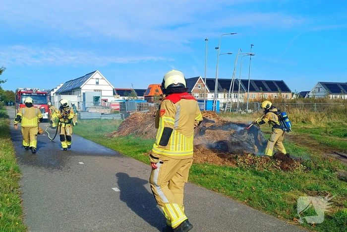 Fikse rookontwikkeling bij brand in maaiafval