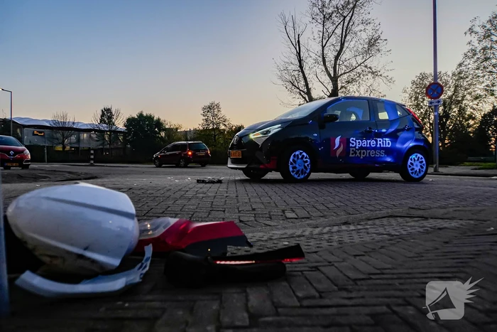 Forse schade aan bezorgauto na botsing