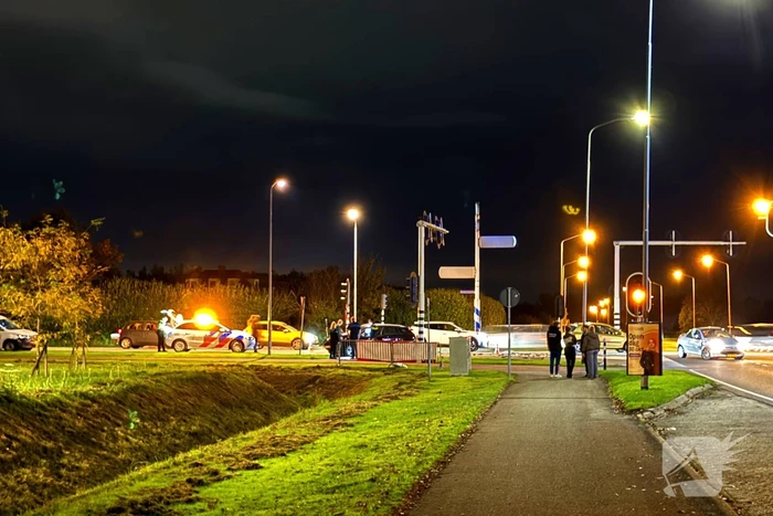 Kruising bezaaid met brokstukken na harde botsing