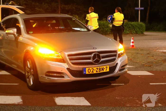 Fatbike bezorger en automobilist met elkaar in botsing