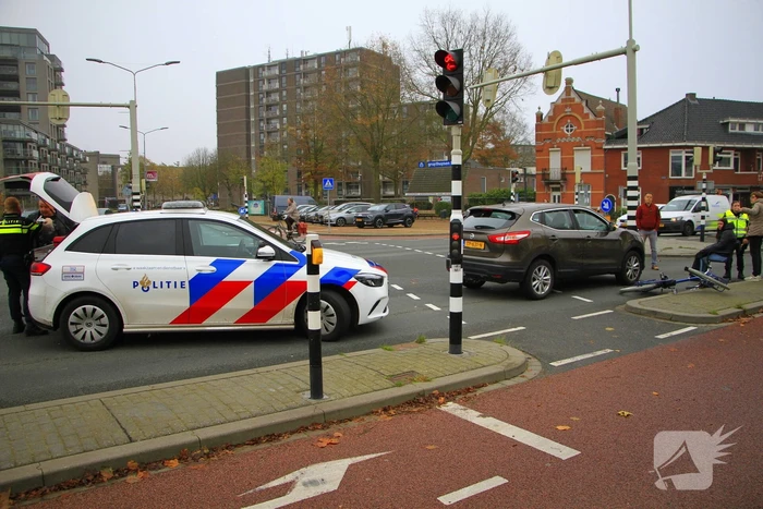 Scholier geschept door automobilist bij verkeerslicht