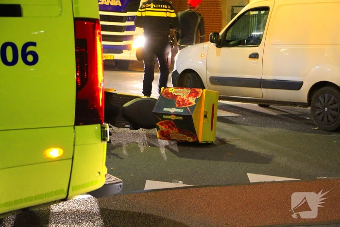 Pizzabezorger geschept op kruising