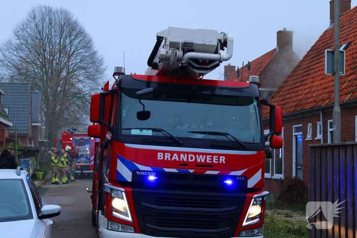 Flinke rookontwikkeling bij middelbrand in woning