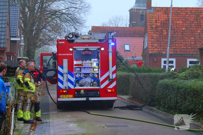 Flinke rookontwikkeling bij middelbrand in woning