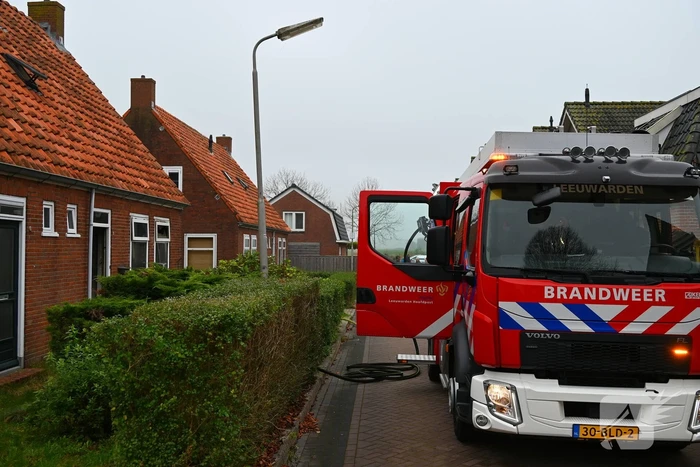 Flinke rookontwikkeling bij middelbrand in woning