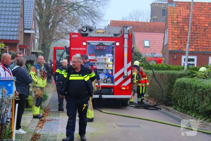 Flinke rookontwikkeling bij middelbrand in woning