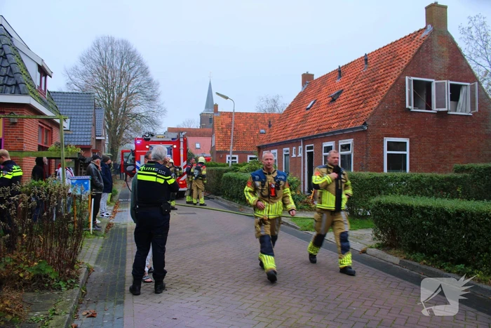 Flinke rookontwikkeling bij middelbrand in woning