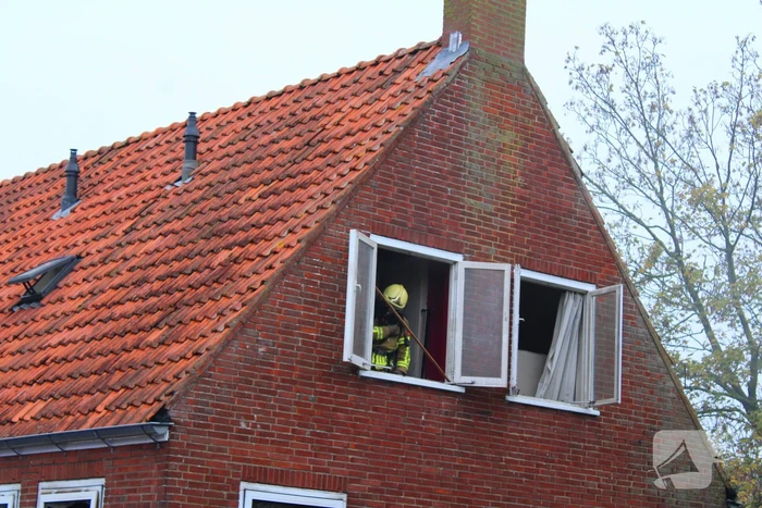 Flinke rookontwikkeling bij middelbrand in woning