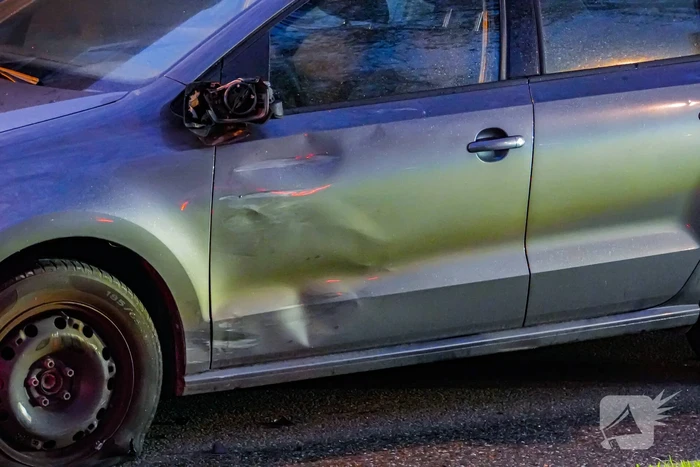 Schade na aanrijding tussen auto en scooter