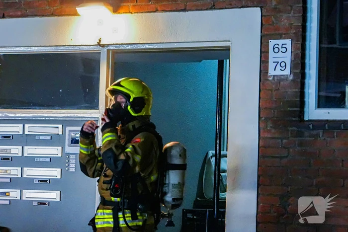 Portiekflat vol rook door brand in afzuigkap