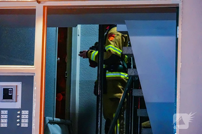 Portiekflat vol rook door brand in afzuigkap