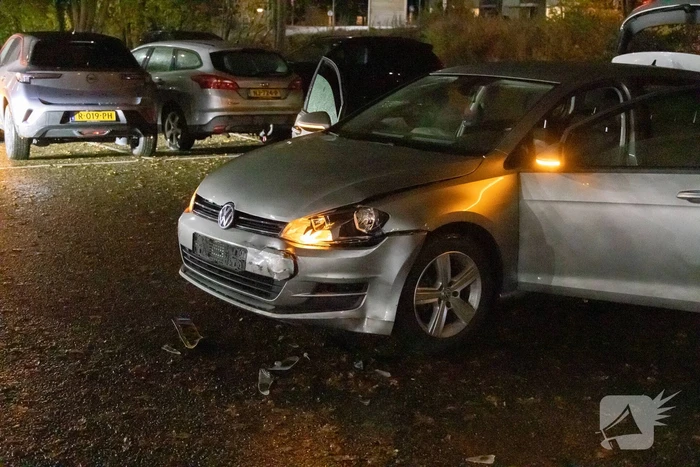 Vuurwapen gezien bij botsingen op parkeerterrein