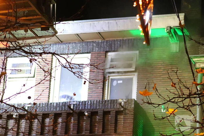 Brandweer blust brand boven café