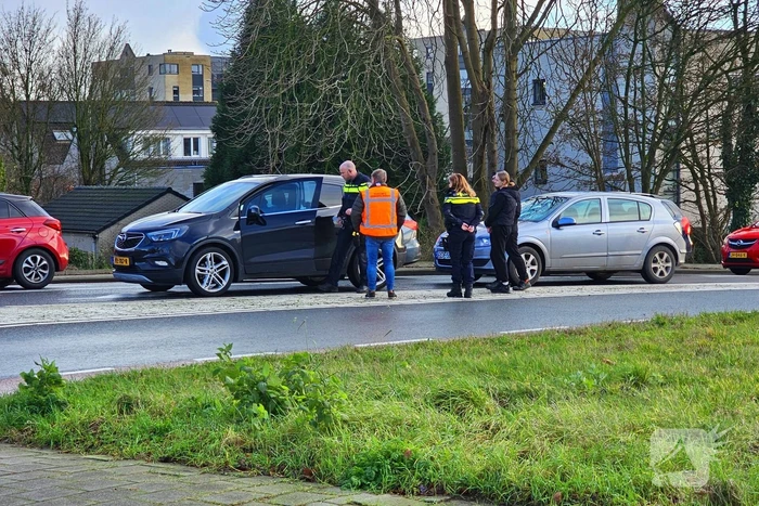 Schade bij kop-staartbotsing twee voertuigen
