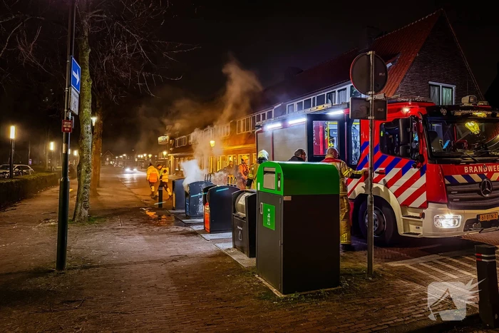 Brandweer laat ondergrondse container vollopen
