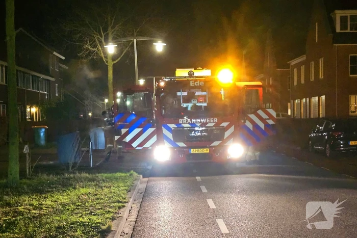 Ondergrondse papiercontainer vat vlam