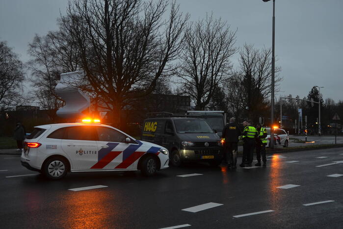 Twee bedrijfsbussen op elkaar geklapt