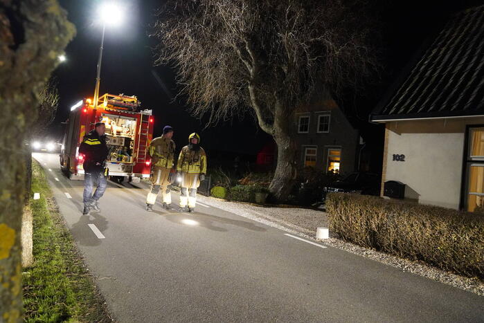 Brandweer blust schoorsteenbrand