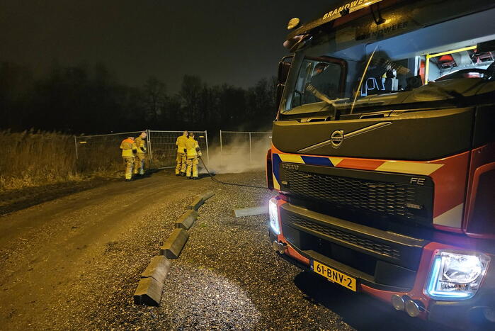 Brandweer blust pallet met afval