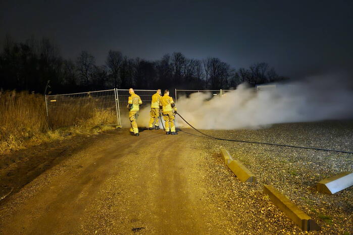 Brandweer blust pallet met afval
