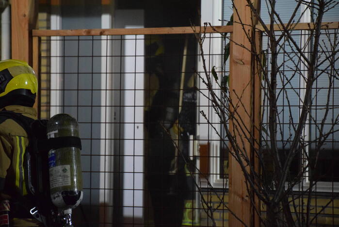 Rookontwikkeling bij brand in woning