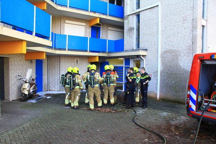 Rookontwikkeling bij brand in berging onder flat