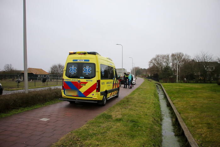 Automobilist belandt in heg na botsing