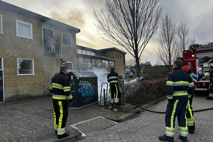 Textielcontainer vat vlam