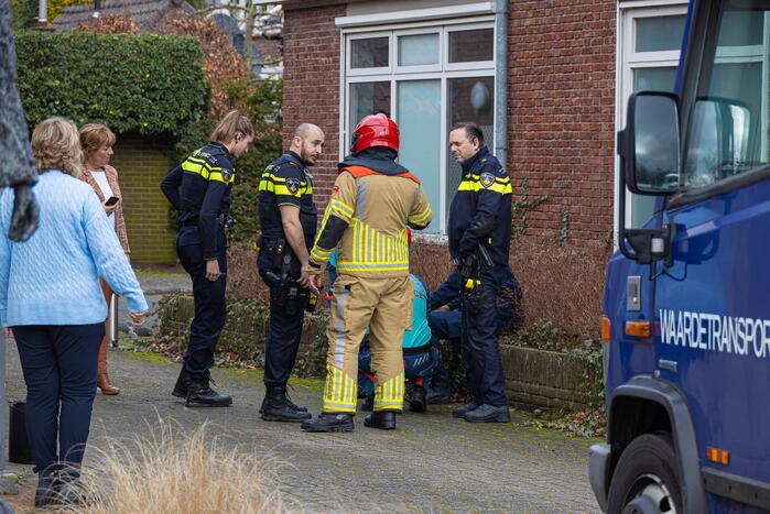 Geldloper vast in deur