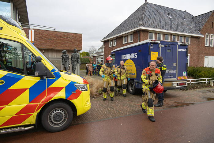 Geldloper vast in deur