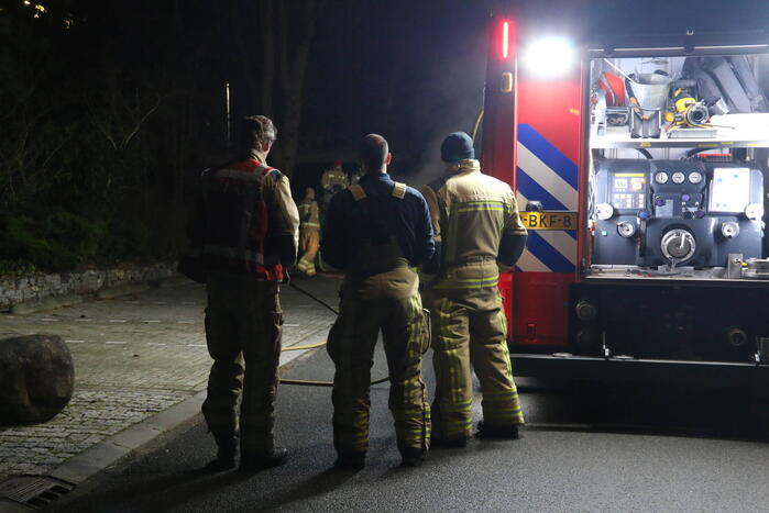 Brand in container met bouwafval