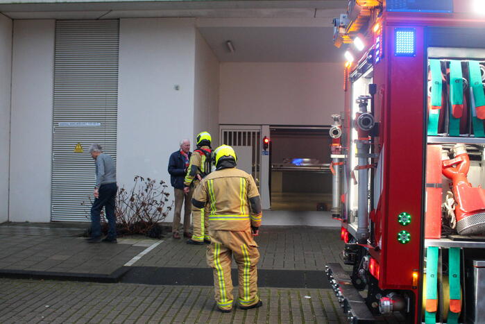 Rookontwikkeling in garage van flat