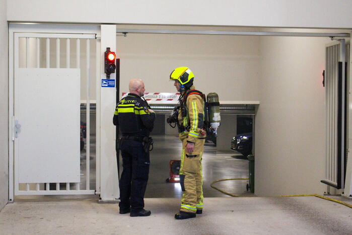 Rookontwikkeling in garage van flat