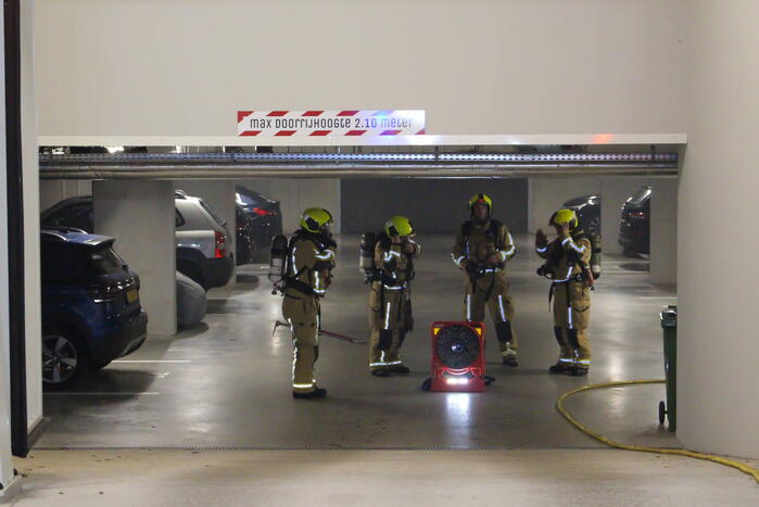 Rookontwikkeling in garage van flat