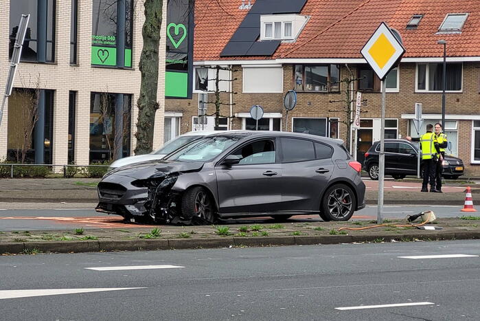 Automobilist ramt verkeerslicht