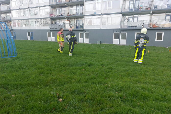 Rookoverlast door barbecue op balkon