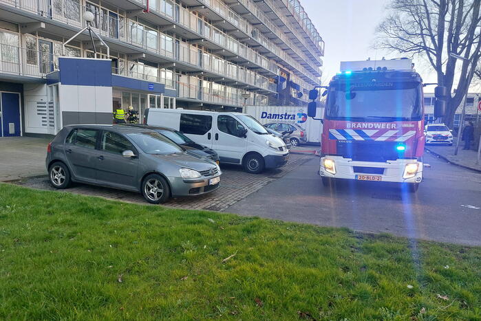 Rookoverlast door barbecue op balkon