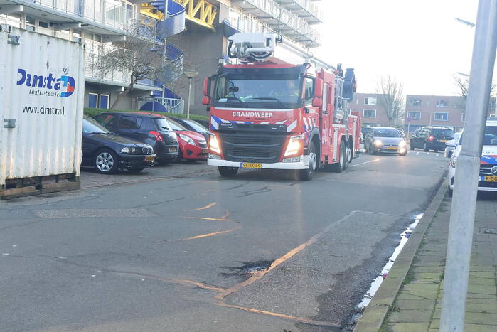 Rookoverlast door barbecue op balkon