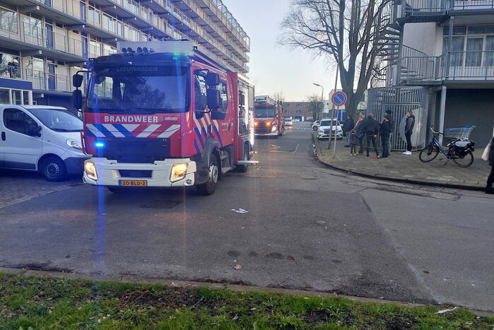 Rookoverlast door barbecue op balkon