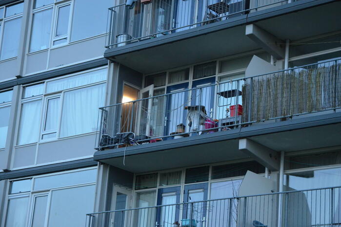 Rookoverlast door barbecue op balkon