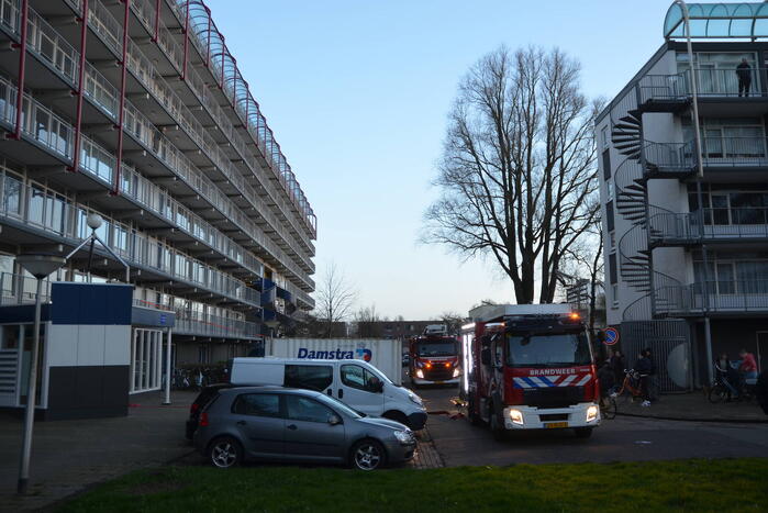 Rookoverlast door barbecue op balkon