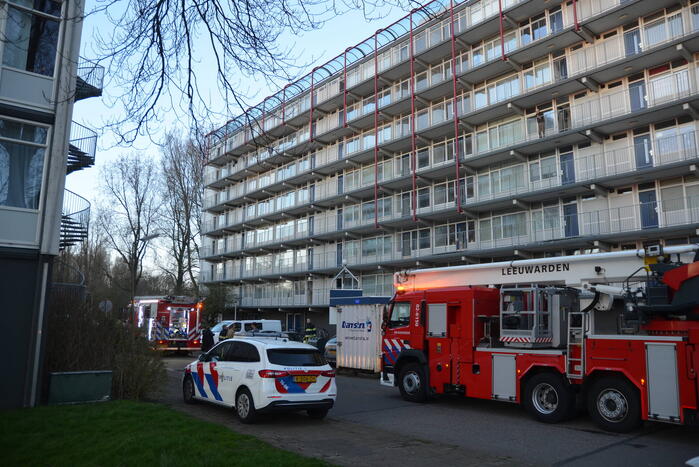 Rookoverlast door barbecue op balkon