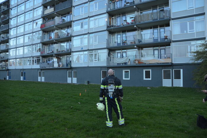Rookoverlast door barbecue op balkon