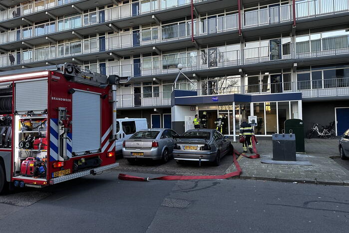 Rookoverlast door barbecue op balkon