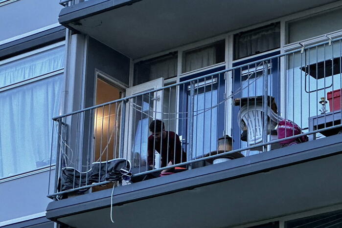 Rookoverlast door barbecue op balkon