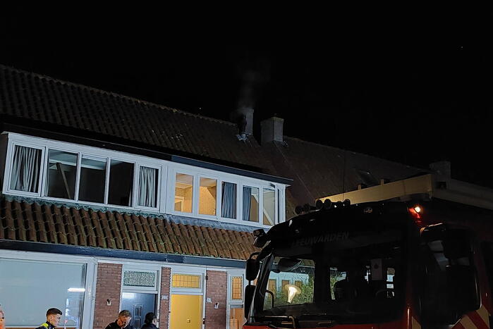 Brand in schoorsteen van woning