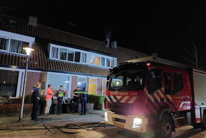 Brand in schoorsteen van woning